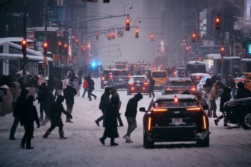 People cross streets in Manhattan on Jan. 25, 2026