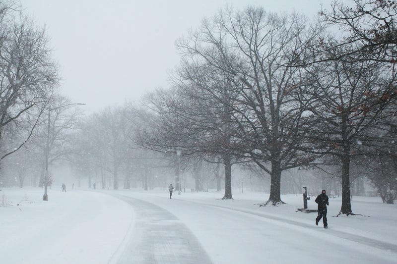 People run in Prospect Park amid a winter storm on Jan. 25, 2026