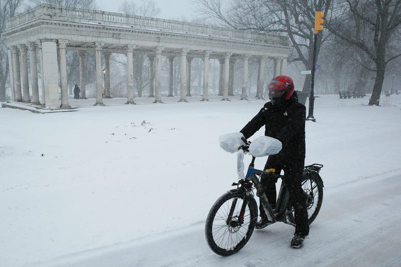 A person rides an e-bike.