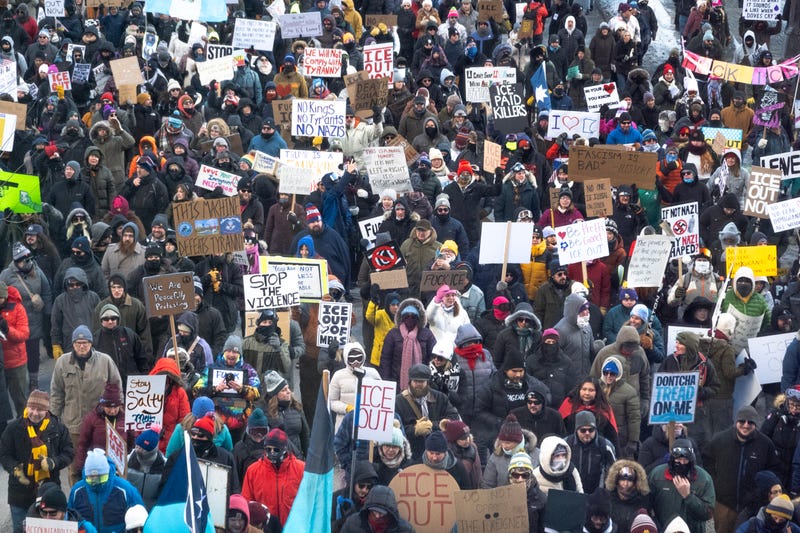  Demonstrators march through downtown protesting ICE operations and the death of Renee Good and Alex Pretti on January 25, 2026 in Minneapolis, Minnesota.