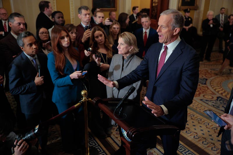 Senate Majority Leader John Thune (R-SD) talks with reporters with Sen. Shelley Moore Capito (R-WV) following the weekly Senate Republican policy luncheon at the U.S. Capitol on January 28, 2026 in Washington, DC. A partial federal government shutdown looms as Senate Democrats have threatened to hold up funding for the Department of Homeland Security after two U.S. citizens were murdered by Immigration and Customs Enforcement agents in Minneapolis.