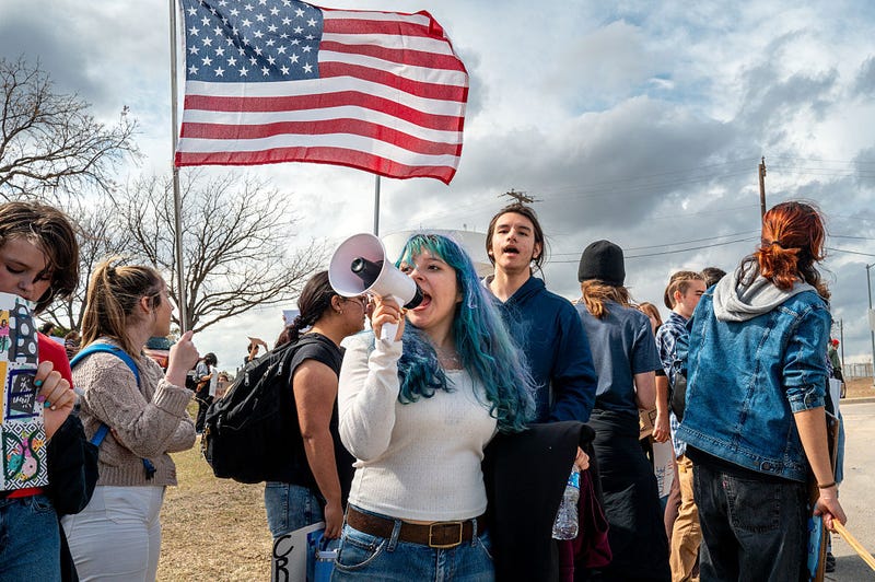 Students gather in protest against ICE during a walkout on February 02, 2026 in Pflugerville, Texas.