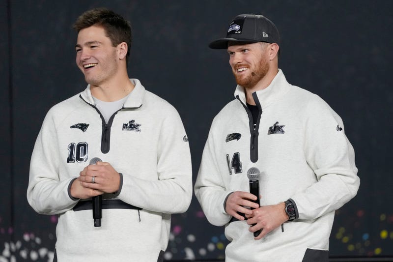 SAN JOSE, CALIFORNIA - FEBRUARY 02: Sam Darnold #14 of the Seattle Seahawks and Drake Maye #10 of the New England Patriots look on during Super Bowl LX Opening Night at San Jose McEnery Convention Center on February 02, 2026 in San Jose, California. (Photo by Thearon W. Henderson/Getty Images)