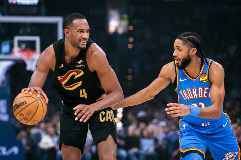 OKLAHOMA CITY, OKLAHOMA - FEBRUARY 22: Evan Mobley #4 of the Cleveland Cavaliers drives to the basket around Isaiah Joe #11 of the Oklahoma City Thunder during the first half at Paycom Center on February 22, 2026 in Oklahoma City, Oklahoma.  (Photo by William Purnell/Getty Images)