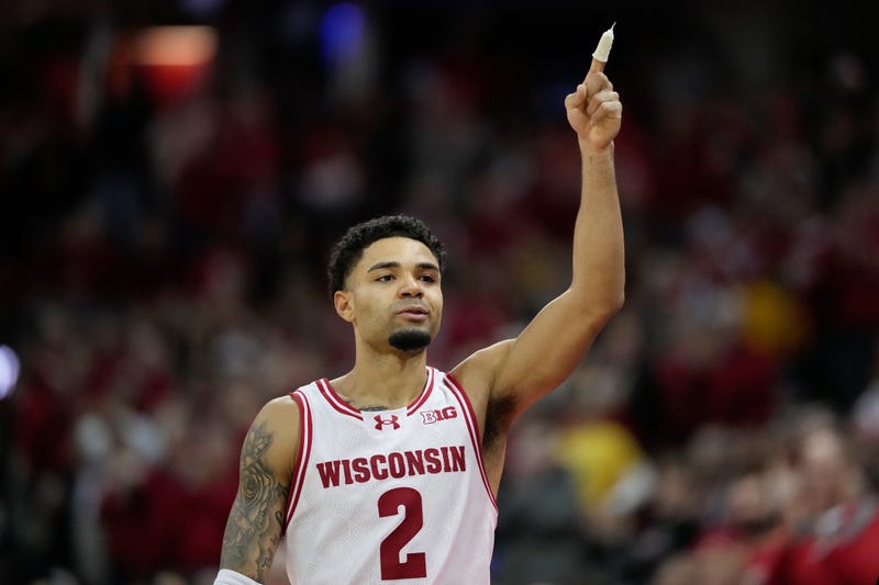 Nick Boyd #2 of the Wisconsin Badgers walks toward the bench in the final seconds of game against the Iowa Hawkeyes at Kohl Center on February 22, 2026 in Madison, Wisconsin.
