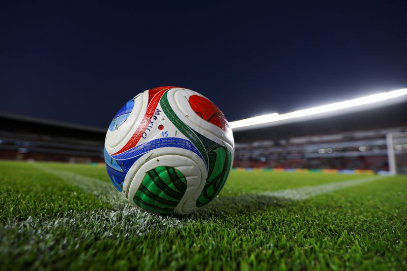 Stock photo of FIFA soccer ball on an empty field