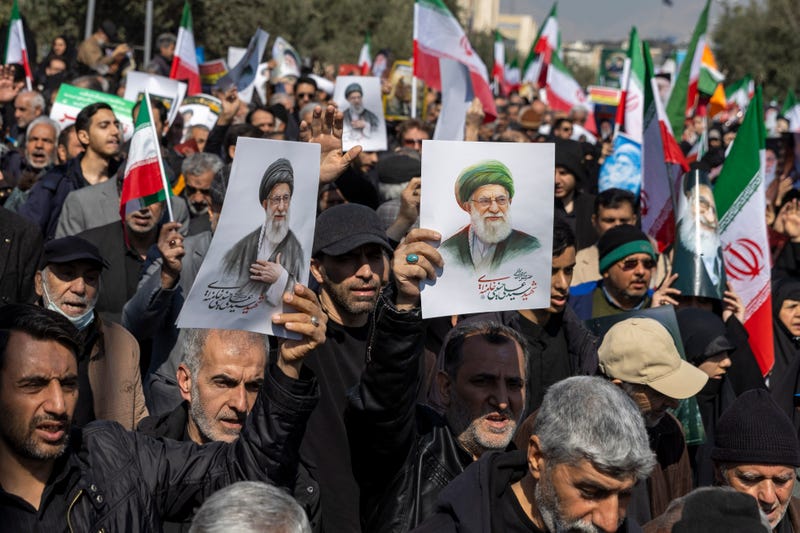 Iranians hold images of Ayatollah Ali Khamenei as they take part in a demonstration against the United States and Israel following Friday prayers on March 6, 2026 in Tehran, Iran.  