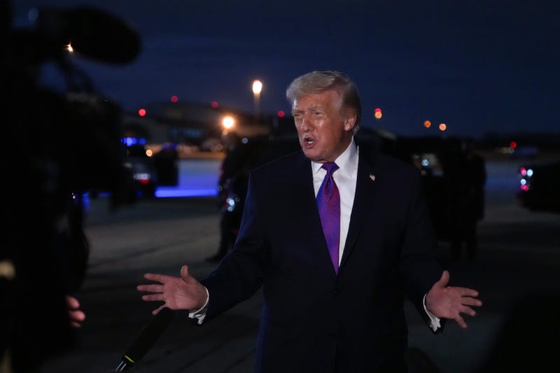 President Donald Trump speaks to the press after landing on Air Force One on March 11, 2026 at Joint Base Andrews, Maryland