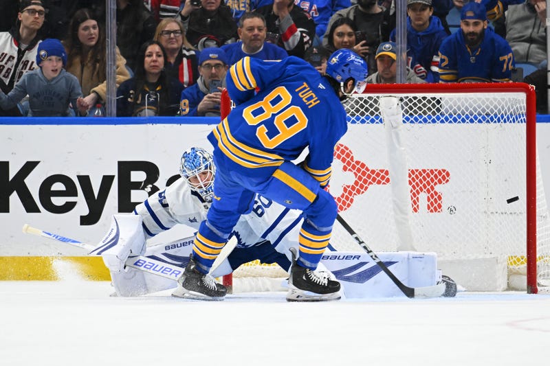  Alex Tuch #89 of the Buffalo Sabres scores a shootout goal against Joseph Woll #60 of the Toronto Maple Leafs 