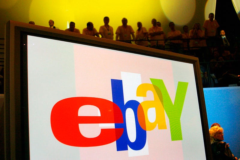 A large monitor display the Ebay logo as fans watch entertainers at an Ebay Live event on September 27, 2003 in Berlin, Germany.