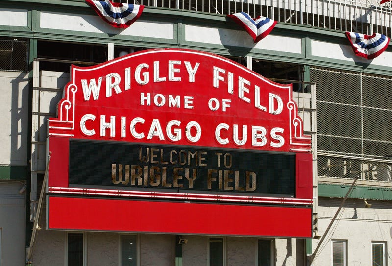 The "Wrigley Field Home Of The Chicago Cubs" marquee is visible October 13, 2003 Chicago, Illinois.