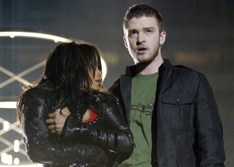Singers Janet Jackson and surprise guest Justin Timberlake perform during the halftime show at Super Bowl XXXVIII between the New England Patriots and the Carolina Panthers at Reliant Stadium on February 1, 2004 in Houston, Texas. At the end of the performance, Timberlake tore away a piece of Jackson's outfit. 