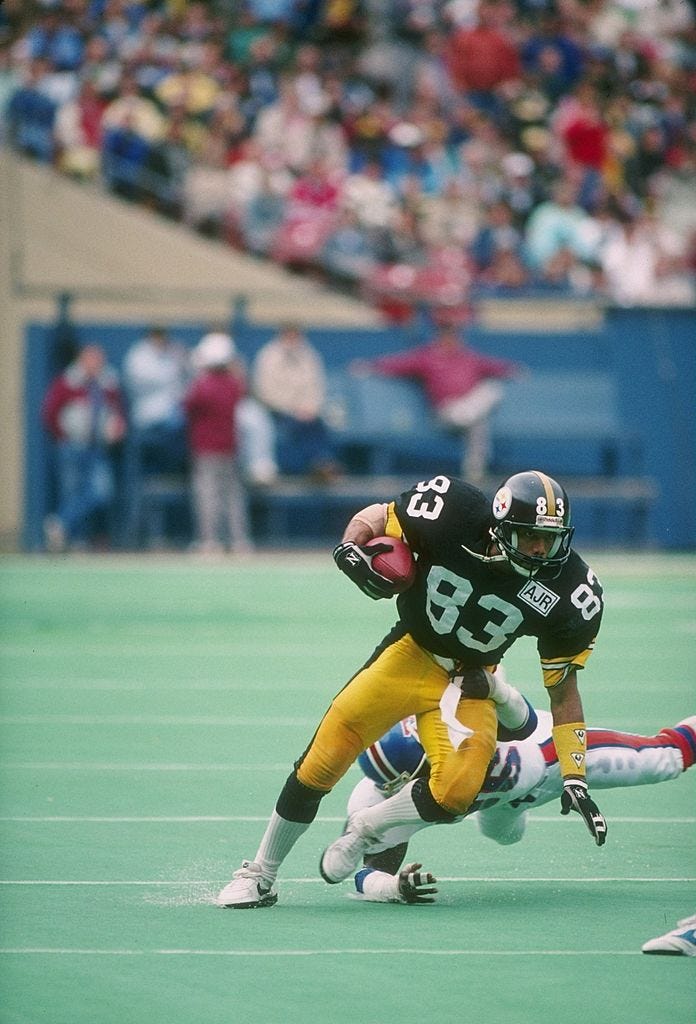 Louis Lipps running with football