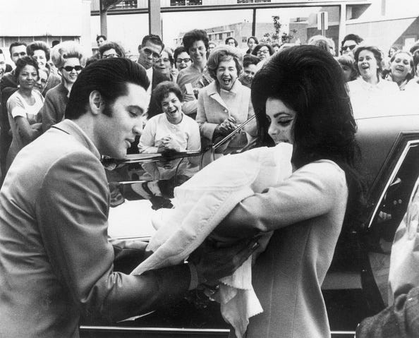 13th February 1968: Elvis and Priscilla Presley with their daughter, Lisa Marie, born on 2nd February. (Photo by Keystone/Getty Images)