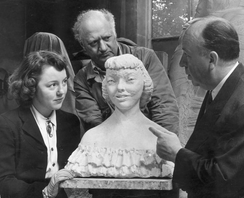 British sculptor Jacob Epstein (1880 - 1959) has just finished his model of Patricia Hitchcock, daughter of British film director Alfred Hitchcock