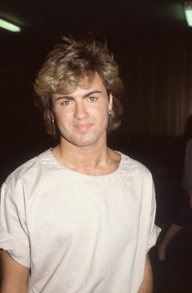 English pop star and one half of the duo 'Wham', George Michael, arriving at Heathrow Airport. 