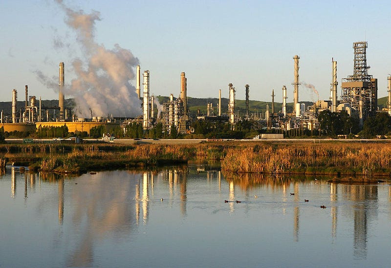 Smoke drifts away from what was then known as the Shell Oil refinery April 1, 2004 in Martinez, California
