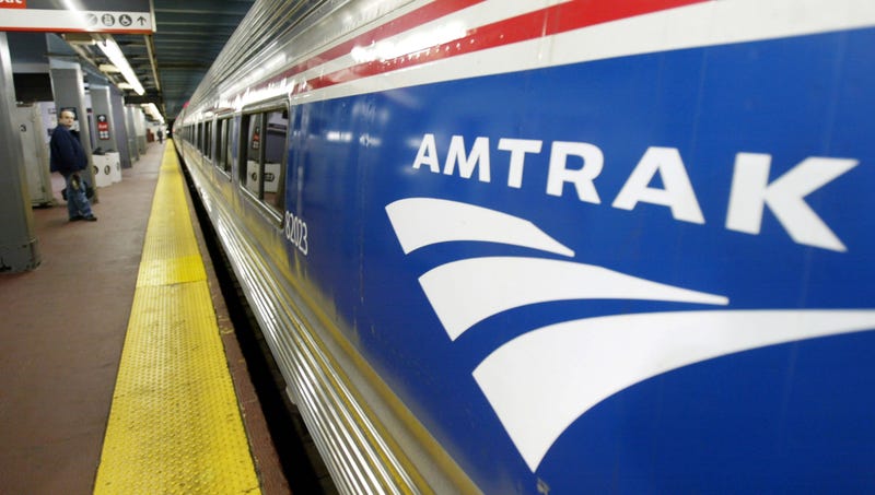 An Amtrak passenger waits for his train at Penn Station April 2, 2004 in New York City. Security officials have received recent threats regarding the nation's railways. 