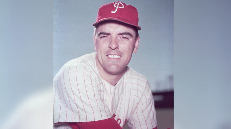 Headshot portrait of baseball pitcher Curt Simmons wearing his Philadelphia Phillies uniform and smiling.