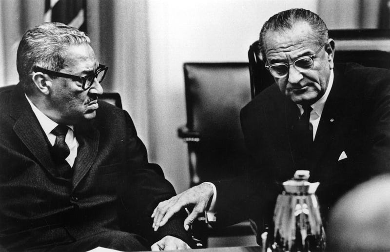 Judge Thurgood Marshall (left) in discussion with statesman Lyndon Baines Johnson, 36th President of the United States of America, following Marshall's appointment as a member of the Supreme Court, the first African-American to hold such a post. (Photo by Keystone/Getty Images)