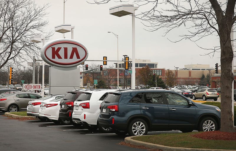 Kia vehicles offered for sale at a Kia dealer in Schaumburg, Ill. on Nov. 21, 2013.