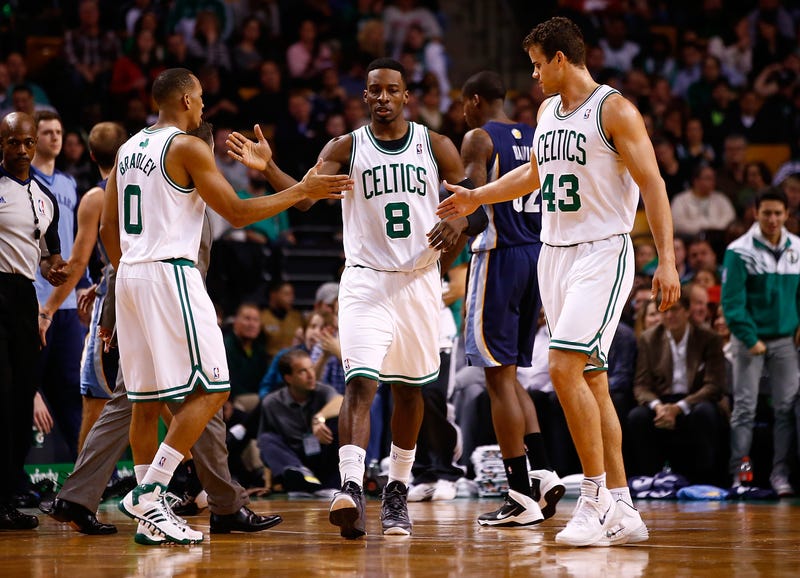 Avery Bradley #0, Jeff Green #8, and Kris Humphries #43 of the Boston Celtics congratulate each other in the first quarter against the Memphis Grizzlies during the game at TD Garden on November 27, 2013 in Boston, Massachusetts. NOTE TO USER: User expressly acknowledges and agrees that, by downloading and or using this photograph, User is consenting to the terms and conditions of the Getty Images License Agreement. (Photo by Jared Wickerham/Getty Images)
