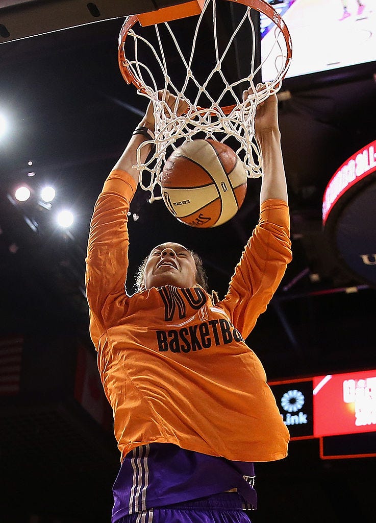 Western Conference All-Star Brittney Griner #42 of the Phoenix Mercury slam dunks during warm ups to the WNBA All-Star Game at US Airways Center on July 19, 2014 in Phoenix, Arizona. The East defeated the West 125-124 in overtime. (Photo by Christian Petersen/Getty Images)