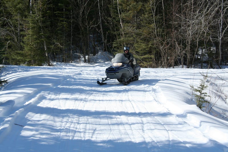 Two people from neighboring states were killed within as many days after they both crashed their snowmobiles in the Upper Peninsula this week, authorities said.