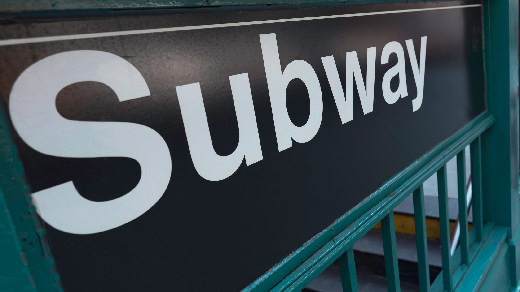Conductor attacked with bottle on B train; attacker at large