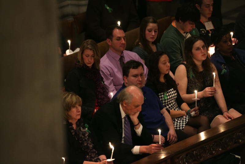 Friends and families of Sandy Hook shooting victims at the National Vigil for Victims of Gun Violence, on December 12, 2013 at the Washington National Cathedral.