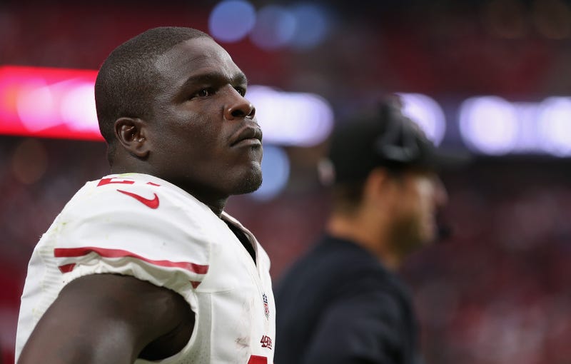 Running back Frank Gore #21 of the San Francisco 49ers watches from the sidelines during the NFL game against the Arizona Cardinals at the University of Phoenix Stadium on September 21, 2014 in Glendale, Arizona.