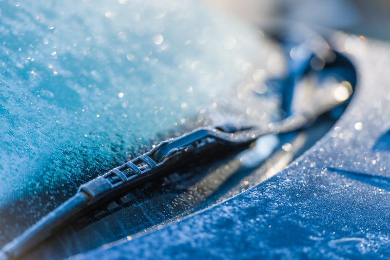 Frost covered car window stock photo.