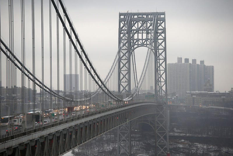 Traffic moves over the Hudson River and across the George Washington Bridge between New York City (R), and in Fort Lee, New Jersey on December 17, 2013.