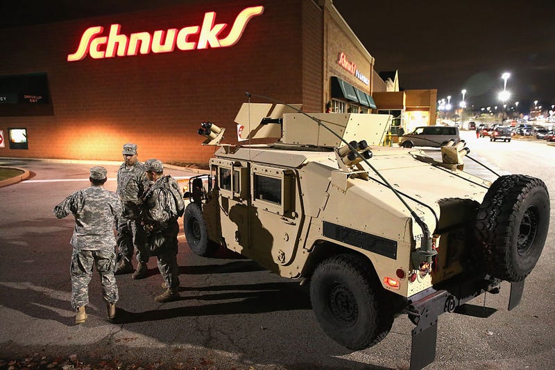 National Guard troops arrive ahead of the grand jury announcement in the Michael Brown shooting case on November 24, 2014 in Ferguson, Missouri.