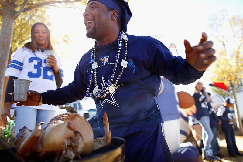 Dallas Cowboys fan Junior Collins enjoys a tailgate party before the Dallas Cowboys take on the Philadelphia Eagles at AT&T Stadium on November 27, 2014 in Arlington, Texas. 