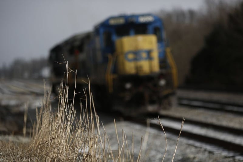 A pair of CSX Transportation-owned C40-8 General Electric locomotives sit idle