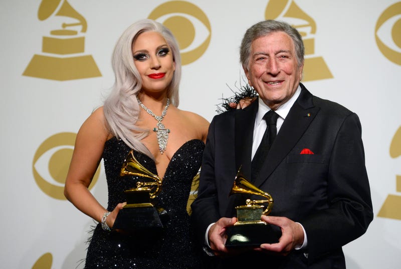 Singers Lady Gaga (L) and Tony Bennett, winners of Best Traditional Pop Vocal Album for 'Cheek to Cheek,' pose in the press room during The 57th Annual GRAMMY Awards at the STAPLES Center on February 8, 2015 in Los Angeles, California