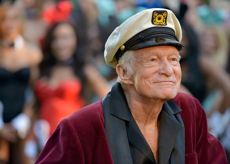 Hugh Hefner poses at Playboy's 60th Anniversary special event on January 16, 2014 in Los Angeles, California.