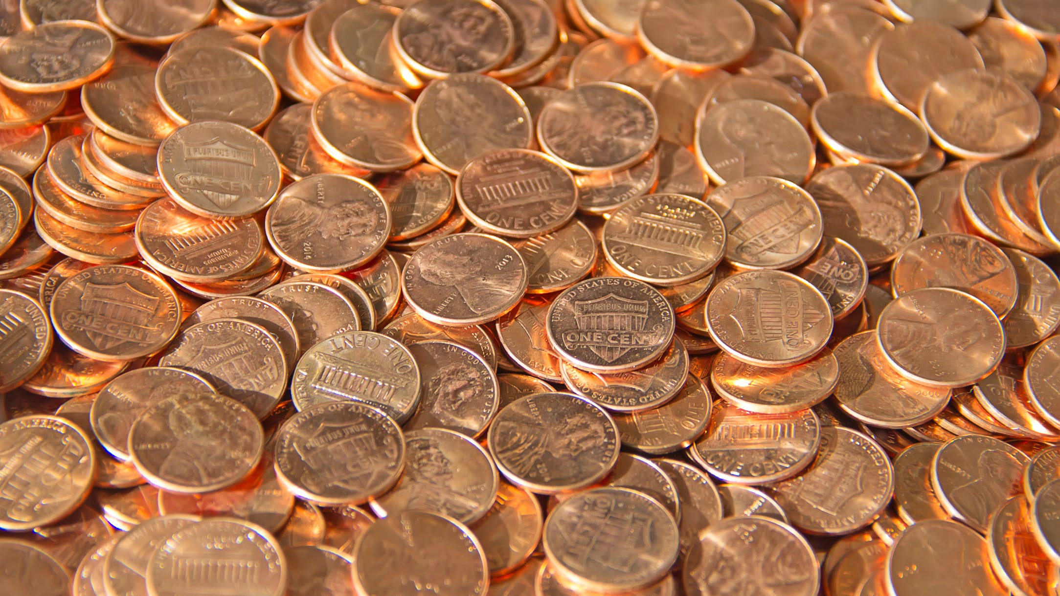 Man spreads 80,000 pennies on ex's lawn as child support payment