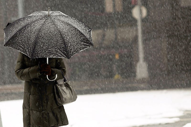 A woman walks through the snow on March 5, 2015 in the Brooklyn borough of New York City.