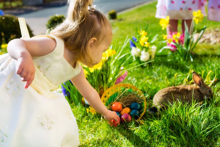 little girl on an easter egg hunt