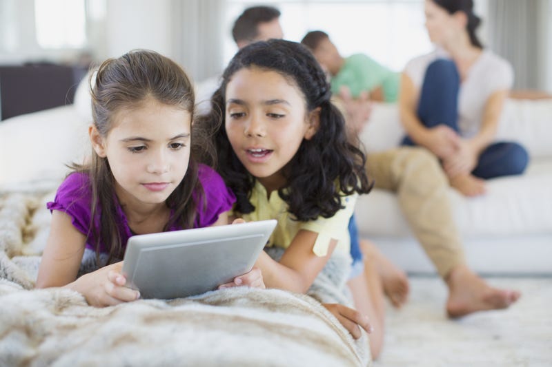 Girls watching a video on a tablet 