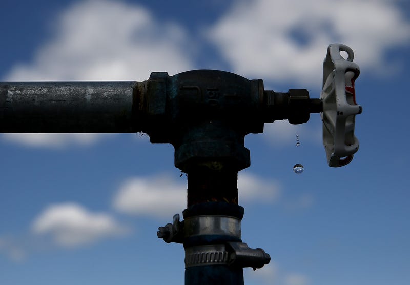 Water drips from a faucet at the Dublin San Ramon Services District (DSRSD) residential recycled water fill station on April 8, 2015 in Pleasanton, California.