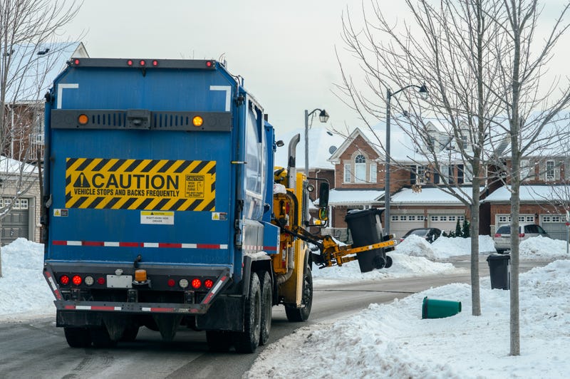 Garbage truck in the snow