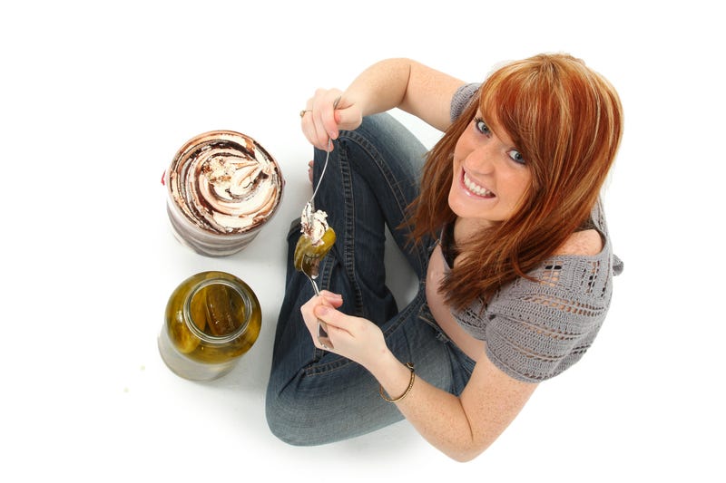 woman eating pickles and ice cream