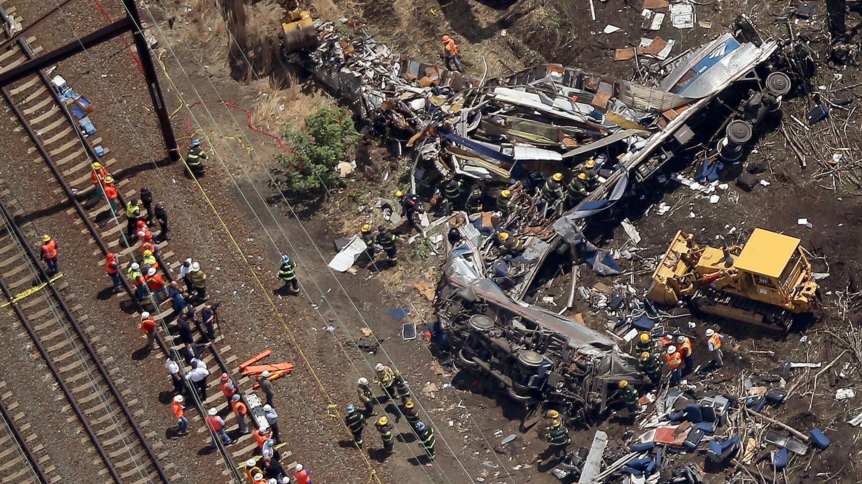 Gruesome photos from Amtrak derailment scene become focus of train engineer's trial