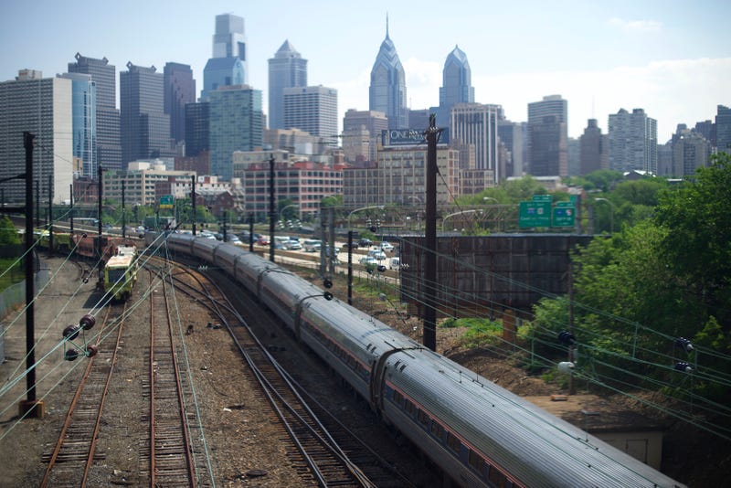 A northbound Amtrak train approaches 30th Street Station.