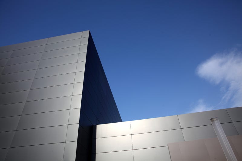 FILE: Downtown building against a blue sky