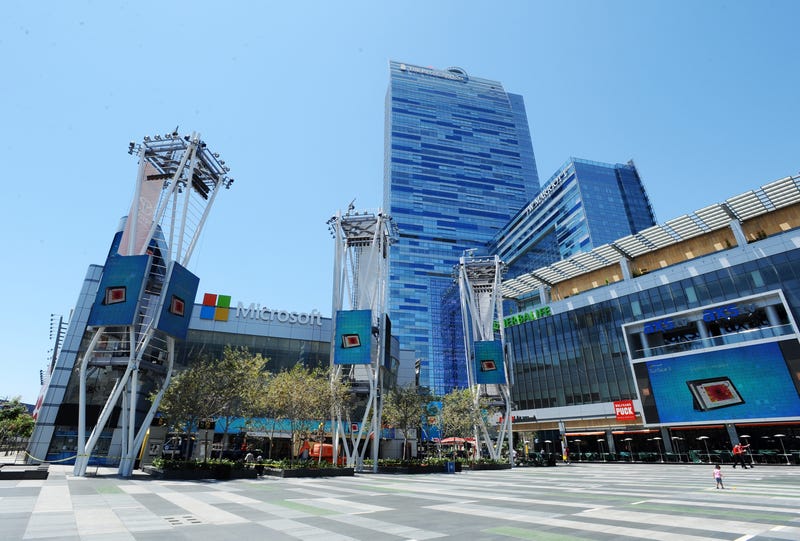 exterior of a huge theater with microsoft signs