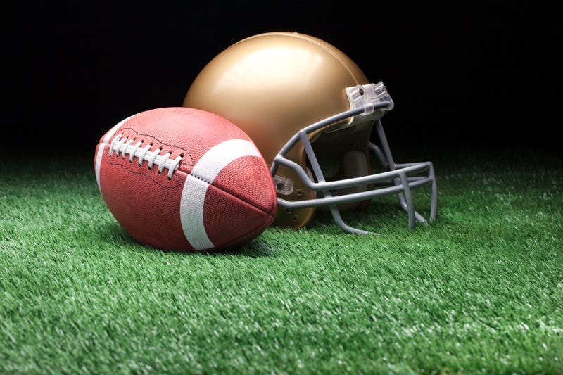 College style football and helmet.